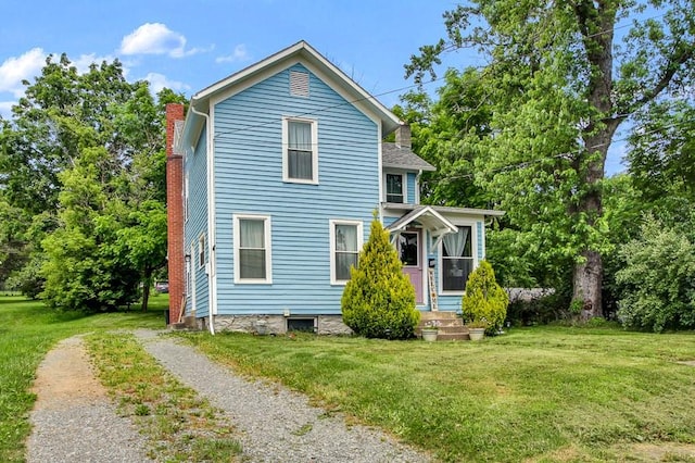 40 Wetmore St, Wellsboro, PA 16901 - traditional-style house with a front yard and a chimney