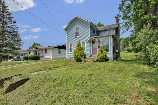 40 Wetmore St, Wellsboro, PA 16901 - traditional-style home with a chimney and a front lawn