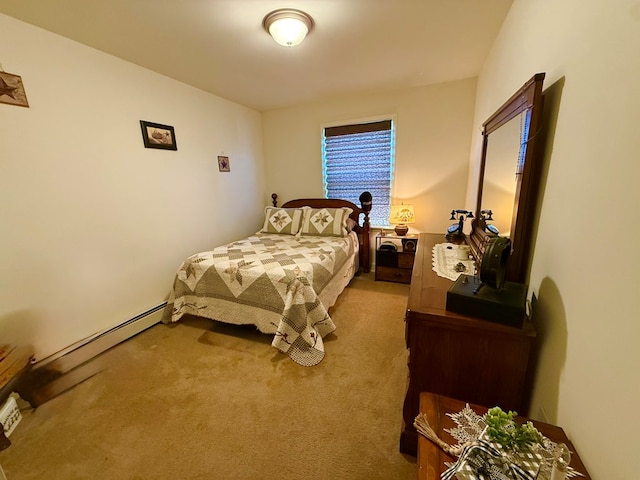 carpeted bedroom featuring a baseboard heating unit