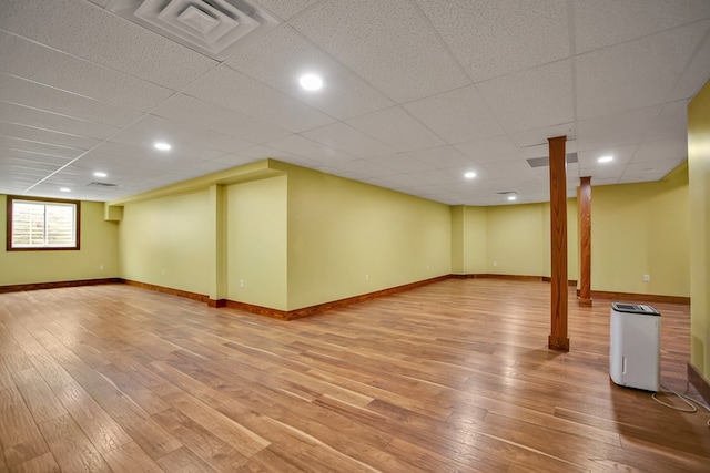 77 Hunters Trl, Wellsboro, PA 16901 - basement with light wood-style floors, baseboards, and a paneled ceiling