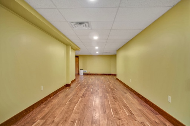 77 Hunters Trl, Wellsboro, PA 16901 - spare room with light wood finished floors, a paneled ceiling, and baseboards