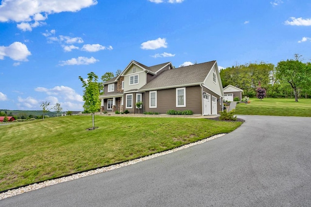 77 Hunters Trl, Wellsboro, PA 16901 - view of front of house featuring a front lawn, a garage, and asphalt driveway