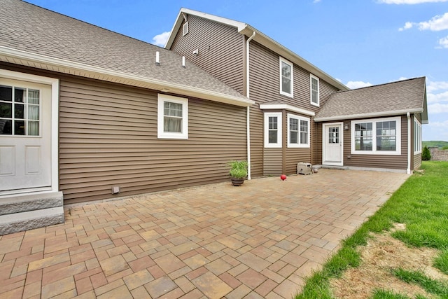 77 Hunters Trl, Wellsboro, PA 16901 - back of house featuring a patio area and roof with shingles