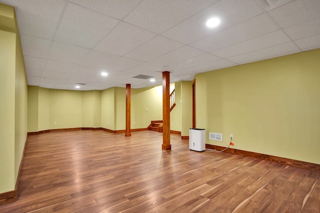 77 Hunters Trl, Wellsboro, PA 16901 - finished below grade area with wood finished floors, baseboards, a drop ceiling, and stairs