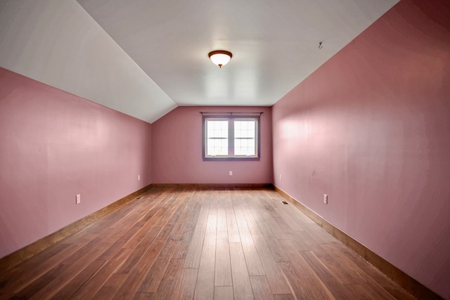 77 Hunters Trl, Wellsboro, PA 16901 - bonus room with wood finished floors, lofted ceiling, and baseboards