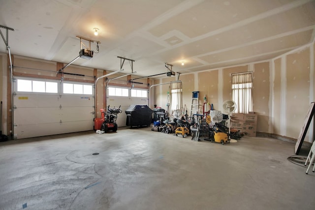 77 Hunters Trl, Wellsboro, PA 16901 - garage featuring a garage door opener