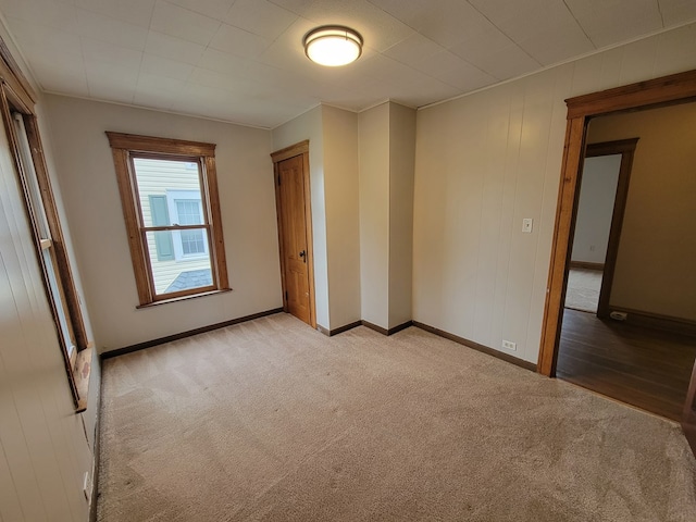 605 Wells Ave, Athens, PA 18810 - unfurnished bedroom with light carpet, baseboards, and a closet