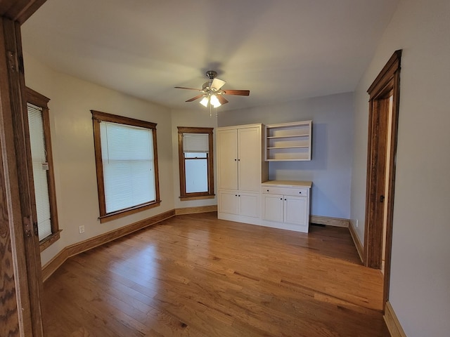 605 Wells Ave, Athens, PA 18810 - spare room with light wood-style flooring, a ceiling fan, and baseboards