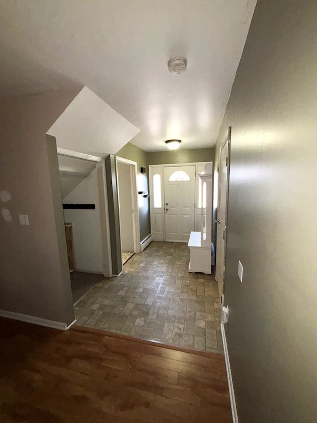 doorway to outside with dark hardwood / wood-style floors