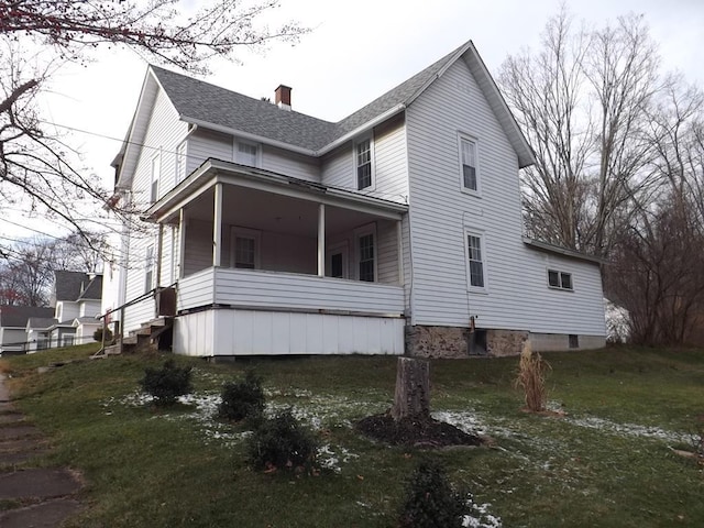 view of property exterior featuring a lawn