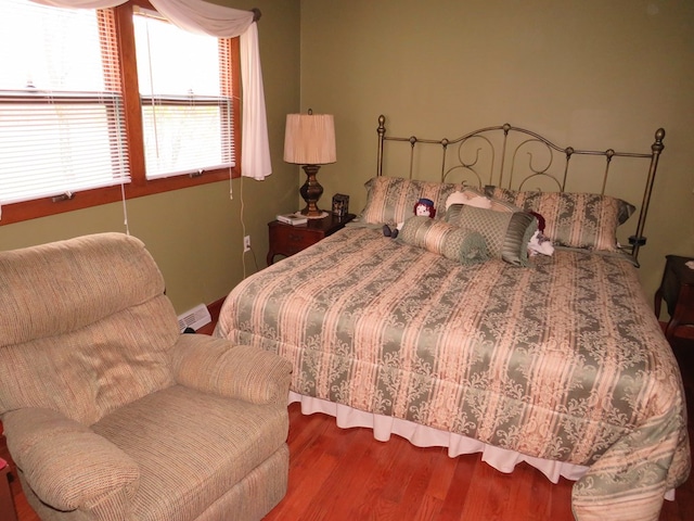 bedroom featuring hardwood / wood-style flooring