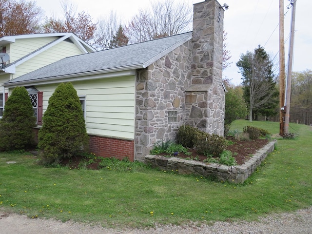 view of property exterior featuring a yard