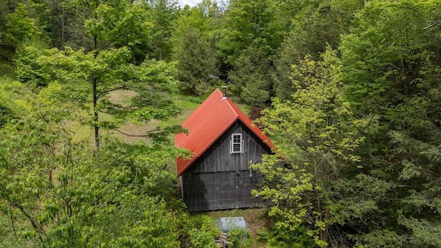 511 Steam Mill Rd, Wellsboro, PA 16901 - view of side of home featuring a view of trees and metal roof