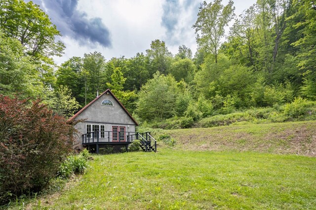 511 Steam Mill Rd, Wellsboro, PA 16901 - view of grassy yard featuring a wooden deck and a forest view