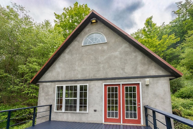 511 Steam Mill Rd, Wellsboro, PA 16901 - back of house featuring a deck, stucco siding, and french doors