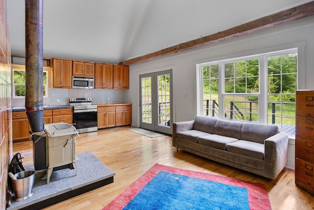511 Steam Mill Rd, Wellsboro, PA 16901 - living area with light wood-style floors and french doors