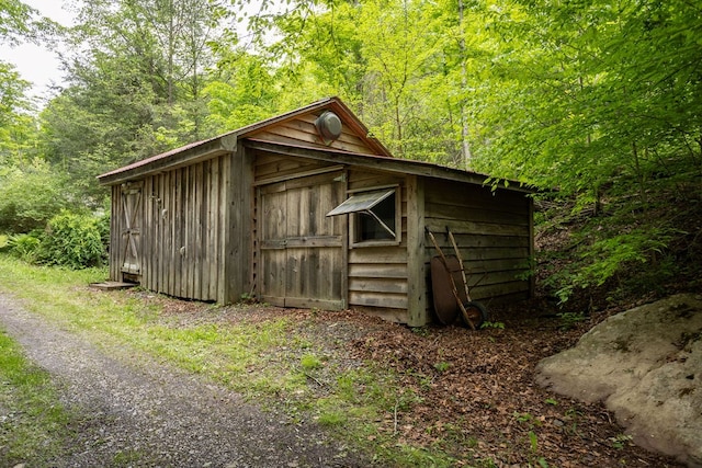 511 Steam Mill Rd, Wellsboro, PA 16901 - view of outdoor structure featuring a wooded view