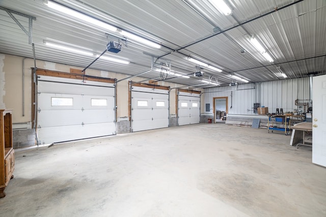 garage featuring a garage door opener