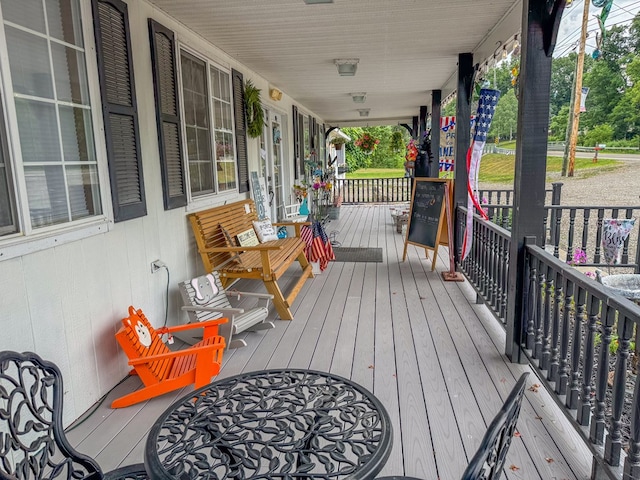 wooden terrace with covered porch