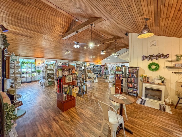 interior space featuring high vaulted ceiling, beamed ceiling, wooden ceiling, and wood finished floors