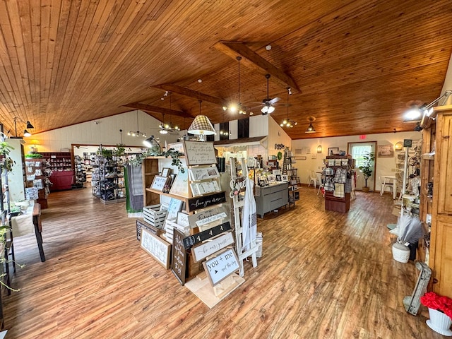 interior space featuring lofted ceiling, wooden ceiling, and wood finished floors