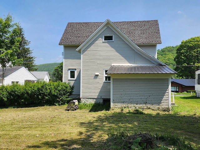 406 E Maple St, Coudersport, PA 16915 - back of property with a lawn