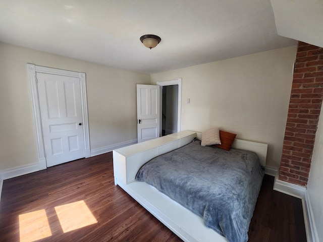 406 E Maple St, Coudersport, PA 16915 - bedroom featuring dark wood finished floors and baseboards
