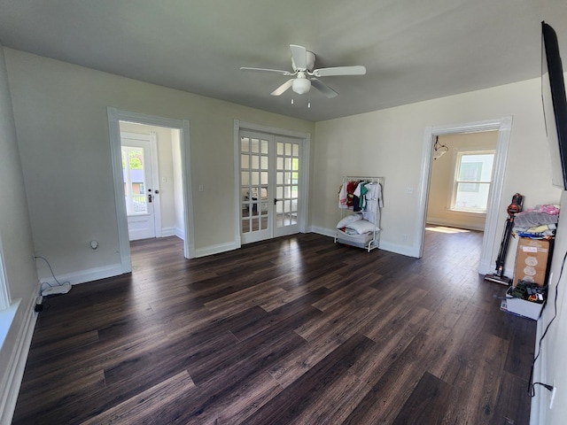 406 E Maple St, Coudersport, PA 16915 - unfurnished living room featuring healthy amount of natural light, ceiling fan, french doors, and dark wood-style floors