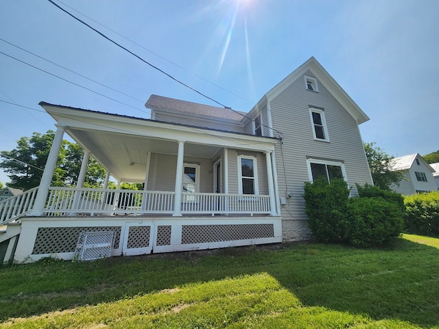 406 E Maple St, Coudersport, PA 16915 - view of front of property with covered porch and a front yard