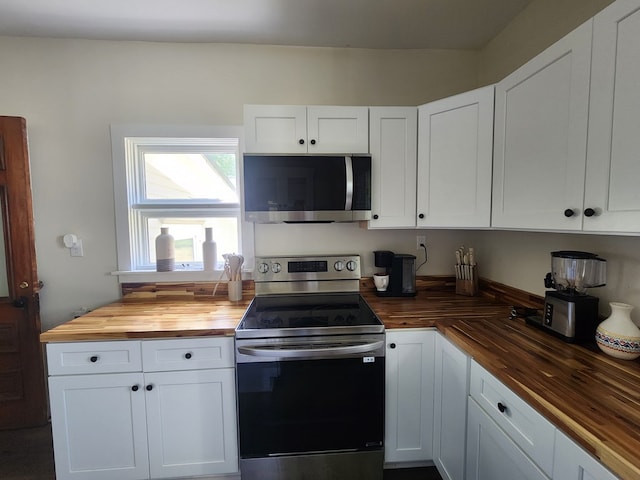 406 E Maple St, Coudersport, PA 16915 - kitchen featuring wooden counters, stainless steel appliances, and white cabinetry