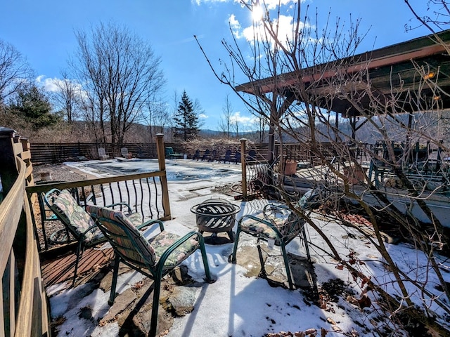 view of patio featuring a fire pit