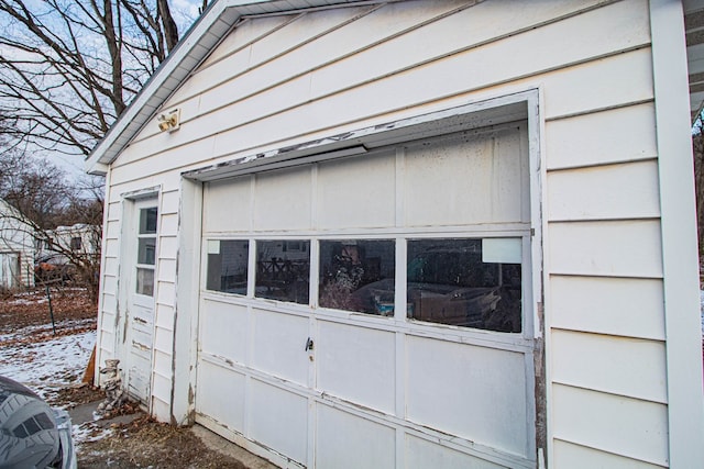 view of snow covered garage