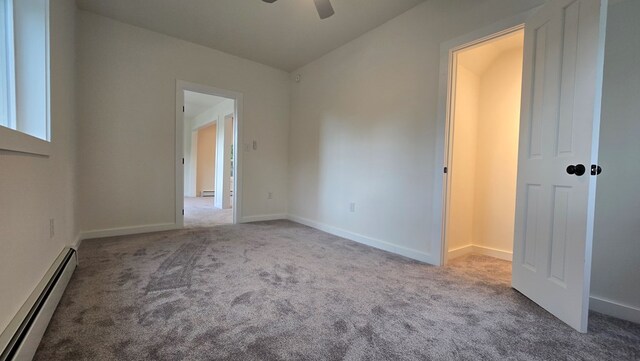 105 Taylor St, Blossburg, PA 16912 - carpeted spare room featuring a baseboard radiator, ceiling fan, baseboard heating, and baseboards