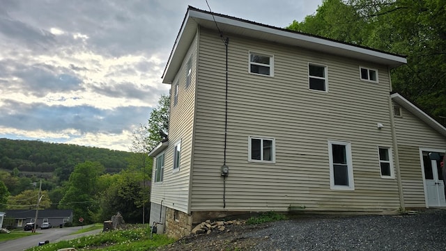 105 Taylor St, Blossburg, PA 16912 - view of home's exterior featuring a wooded view