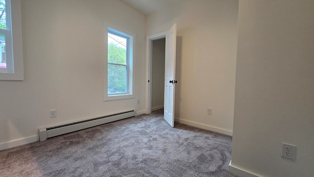 105 Taylor St, Blossburg, PA 16912 - carpeted spare room with baseboard heating and baseboards