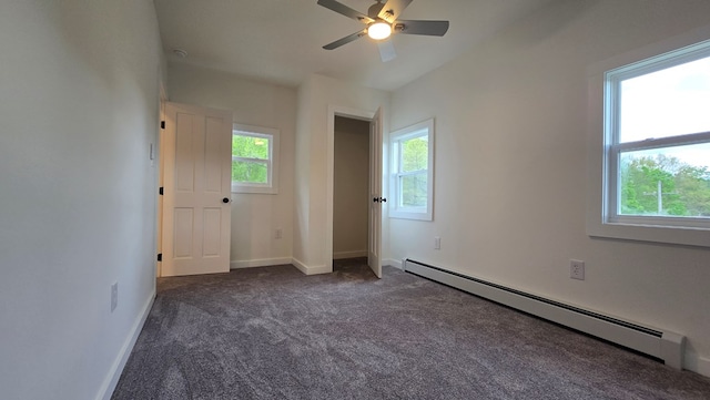 105 Taylor St, Blossburg, PA 16912 - unfurnished room with a baseboard radiator, dark carpet, a ceiling fan, and baseboards
