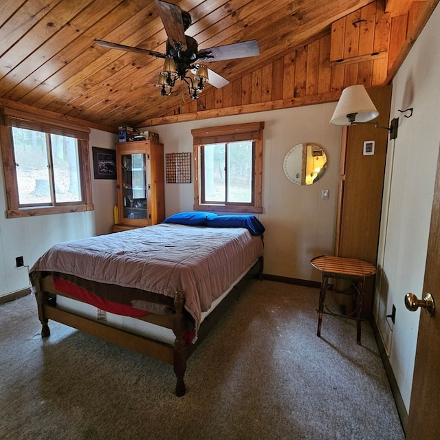 bedroom featuring multiple windows, wood ceiling, carpet flooring, and vaulted ceiling