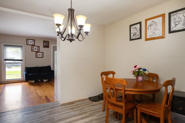 256 Main St, Wellsburg, NY 14894 - dining room with a chandelier and wood finished floors