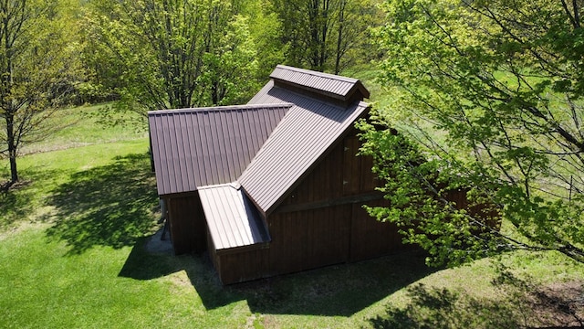view from above of property with a forest