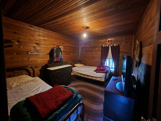 bedroom featuring wood walls