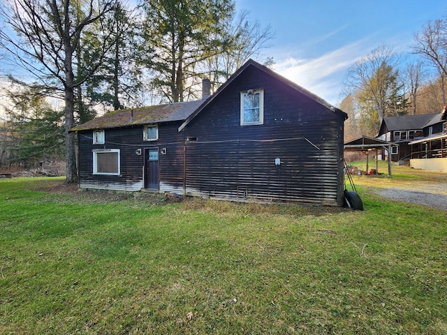 1358 S Brookland Rd, Ulysses, PA 16948 - back of property featuring a lawn and a chimney