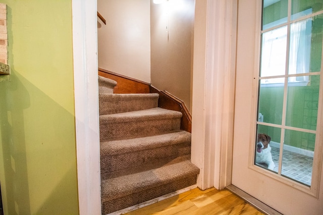 818 W Water St, Elmira, NY 14905 - staircase featuring wood finished floors