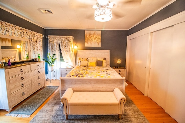 818 W Water St, Elmira, NY 14905 - bedroom featuring light wood-type flooring and crown molding