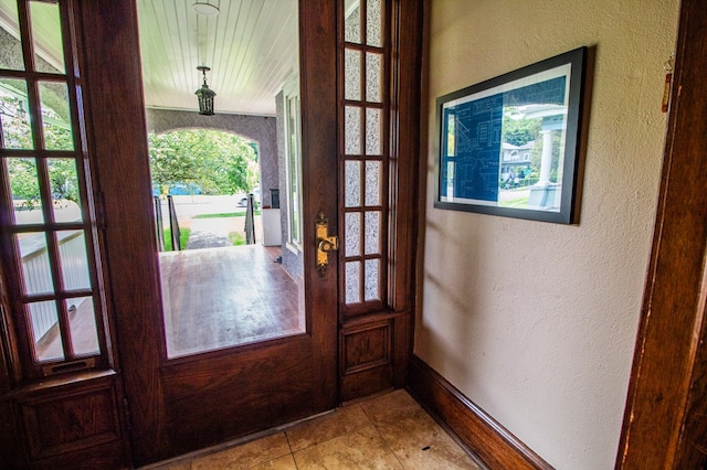 818 W Water St, Elmira, NY 14905 - entrance foyer with a textured wall and wooden ceiling
