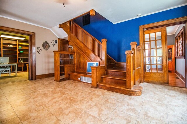 818 W Water St, Elmira, NY 14905 - staircase featuring ornamental molding and tile patterned floors
