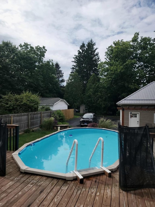 818 W Water St, Elmira, NY 14905 - view of pool with a deck and view of scattered trees