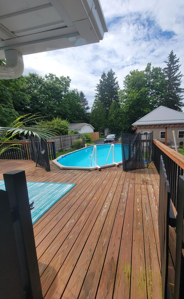 818 W Water St, Elmira, NY 14905 - view of swimming pool featuring a deck