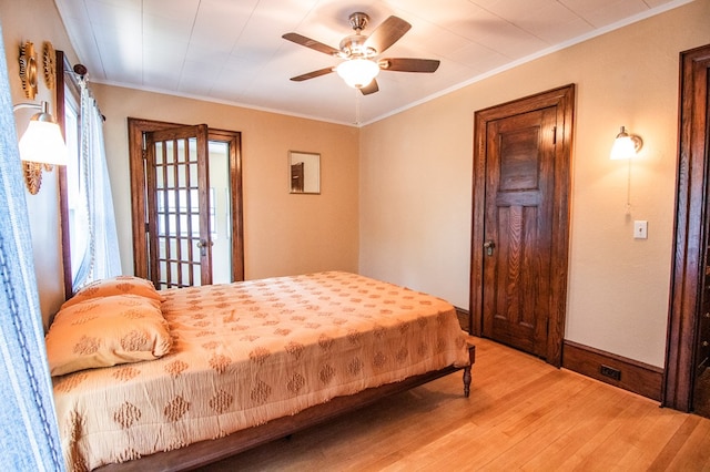 818 W Water St, Elmira, NY 14905 - bedroom featuring light wood finished floors, ornamental molding, and a ceiling fan