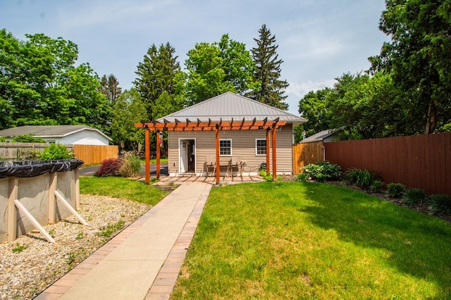 818 W Water St, Elmira, NY 14905 - back of house featuring a pergola, a patio area, a metal roof, and a standing seam roof