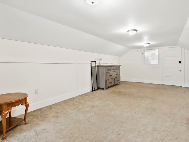 29 Cadwell Ave, Waverly, NY 14892 - additional living space with vaulted ceiling, light carpet, and baseboards